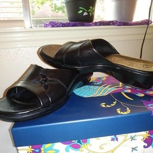 Clarks black leather slides